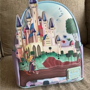 Disney Loungefly Sleeping Beauty Castle Backpack with Purple and Blue Accents